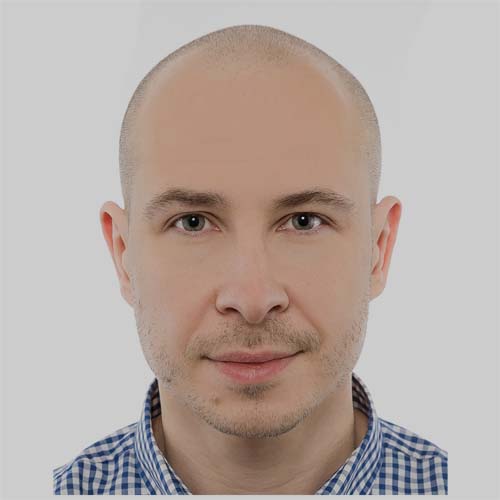 Marcin Staniszewski - zdjęcie portretowe.